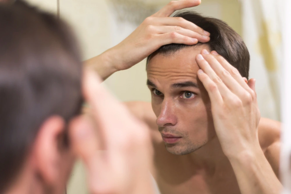 thyroid and hair loss: symptoms & what to test