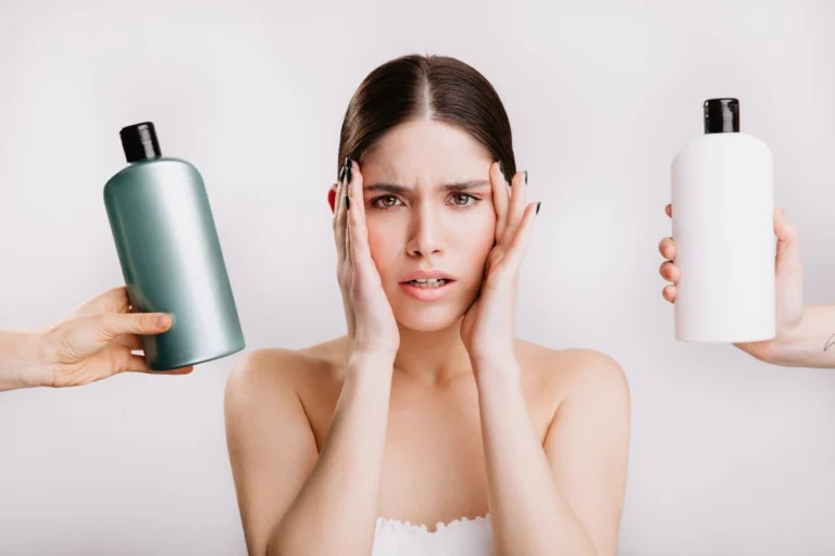 Woman deciding between conditioner and leave-in for conditioner thinning hair routine